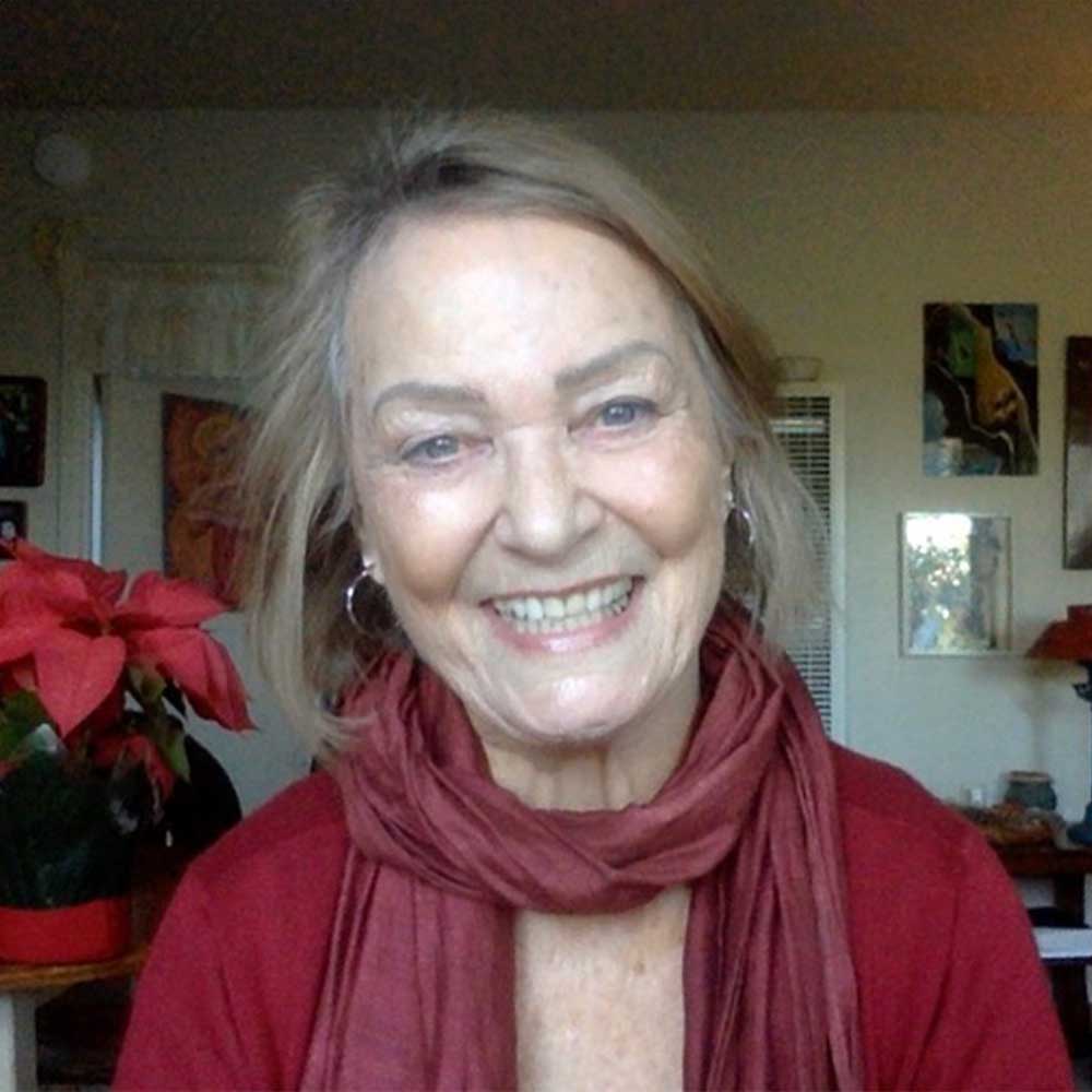 Jacqueline with broad delighted smile